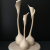 A Volery of Lilies wood sculpture by Marceil DeLacy