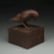 Crow on Box wood sculpture by Marceil DeLacy