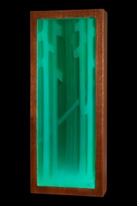Rainforest - a wall hanging sculpture of trees in blue-green epoxy